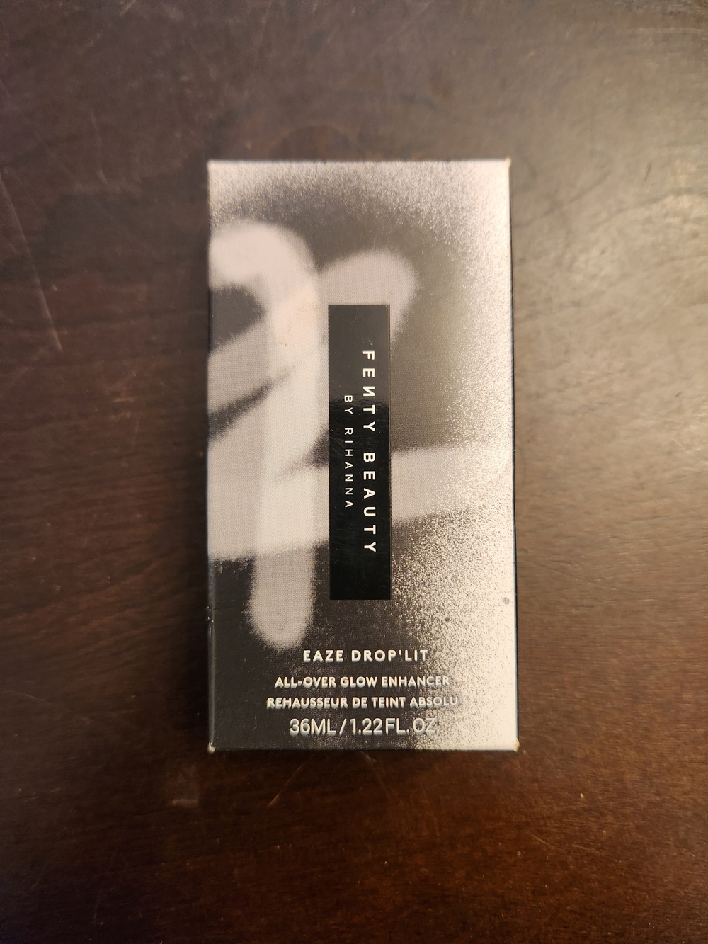 Fenty Beauty Eaze Drop'Lit All-Over Glow Enhancer — Silver and Black Box